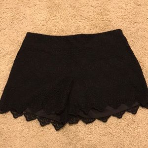 NWOT black lace side zip shorts size 2